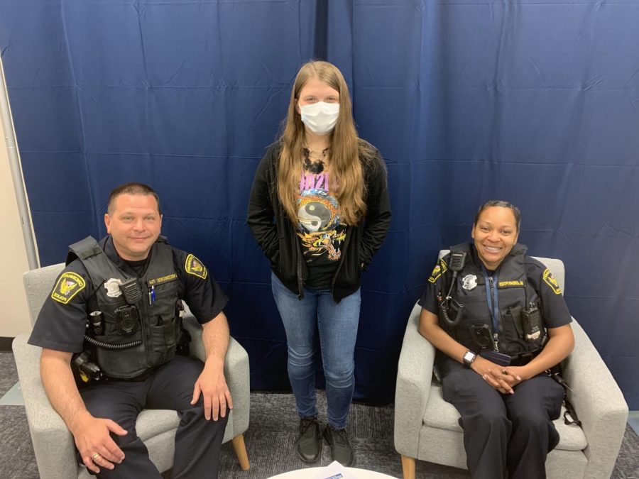 Officer Jordan, Hannah Emmons and Officer Wiz (left to right) after their interview.